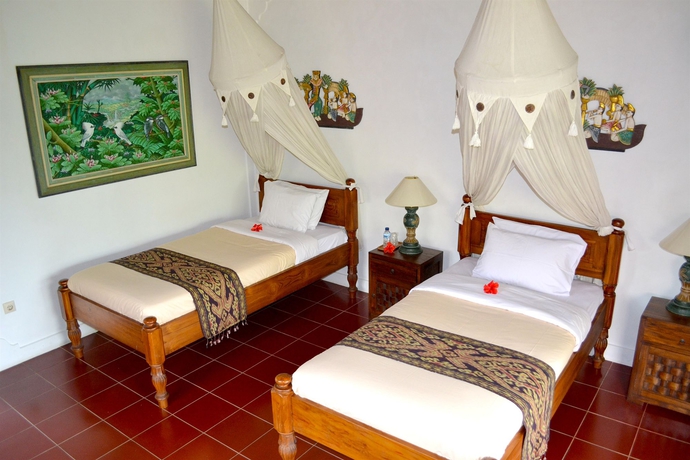 Imagen de la habitación del Hotel Bunga Permai. Foto 10