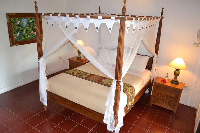 Imagen de la habitación del Hotel Bunga Permai. Foto 11
