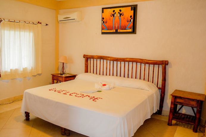 Imagen de la habitación del Hotel Bungalows La Madera, Zihuatanejo. Foto 10