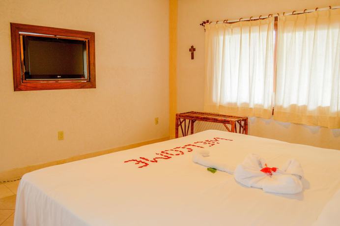 Imagen de la habitación del Hotel Bungalows La Madera, Zihuatanejo. Foto 14