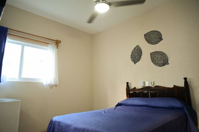 Imagen de la habitación del Hotel Bungalows Las Hamacas. Foto 12