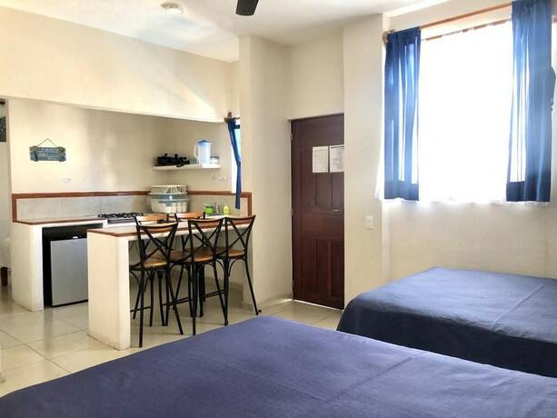 Imagen de la habitación del Hotel Bungalows Las Hamacas. Foto 15