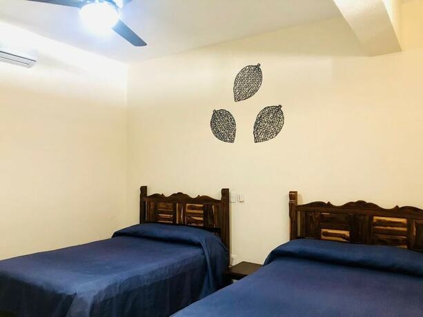 Imagen de la habitación del Hotel Bungalows Las Hamacas. Foto 18