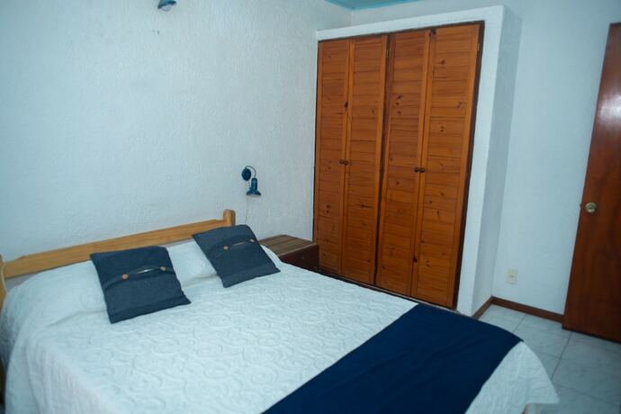 Imagen de la habitación del Hotel Bungalows Los Lucianos del Piemonte. Foto 18