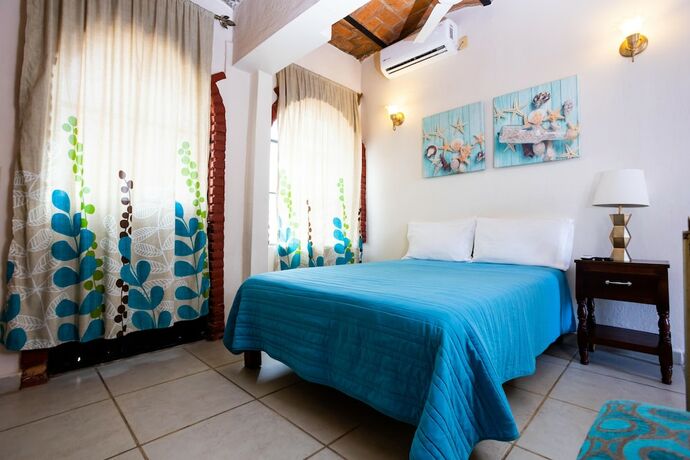 Imagen de la habitación del Hotel Bungalows Maria Teresa. Foto 14