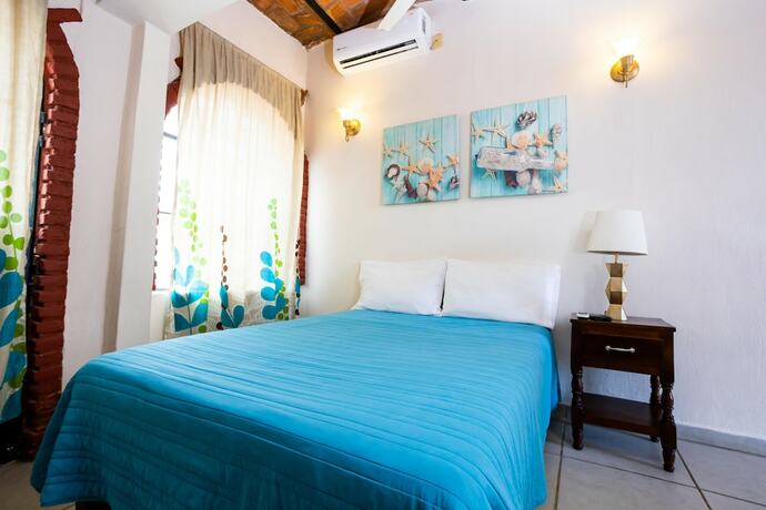 Imagen de la habitación del Hotel Bungalows Maria Teresa. Foto 15