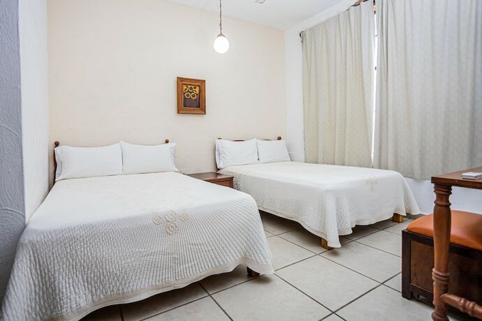 Imagen de la habitación del Hotel Bungalows Maria Teresa. Foto 16