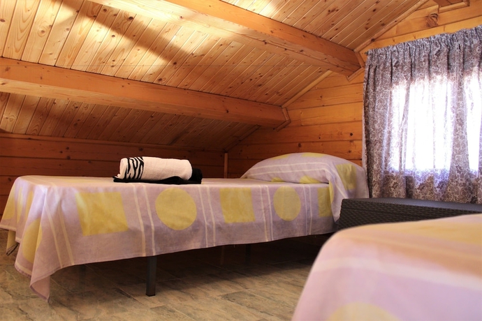 Imagen de la habitación del Hotel Bungalows Oasis. Foto 16
