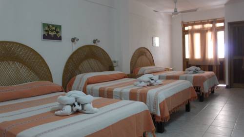Imagen de la habitación del Hotel Bungalows Y Caba&ntilde;as Acuario. Foto 5