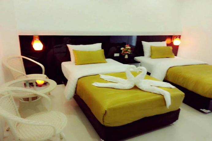 Imagen de la habitación del Hotel Bunganakorn Village. Foto 5