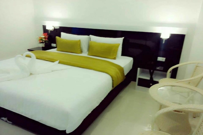 Imagen de la habitación del Hotel Bunganakorn Village. Foto 10