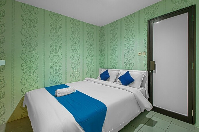 Imagen de la habitación del Hotel Bungur Inn Syariah. Foto 21