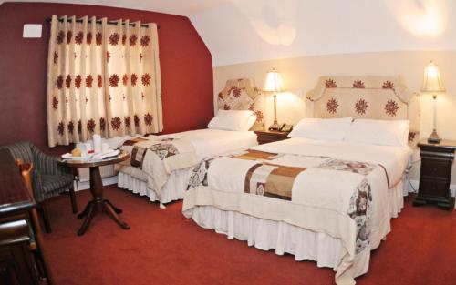 Imagen de la habitación del Hotel Bunratty Manor. Foto 7