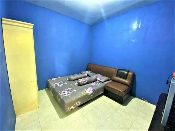 Imagen de la habitación del Hotel Buntusu Guest House. Foto 16