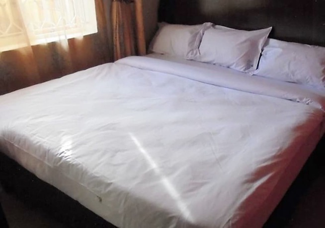 Imagen de la habitación del Hotel Bunyonyi Inn. Foto 5