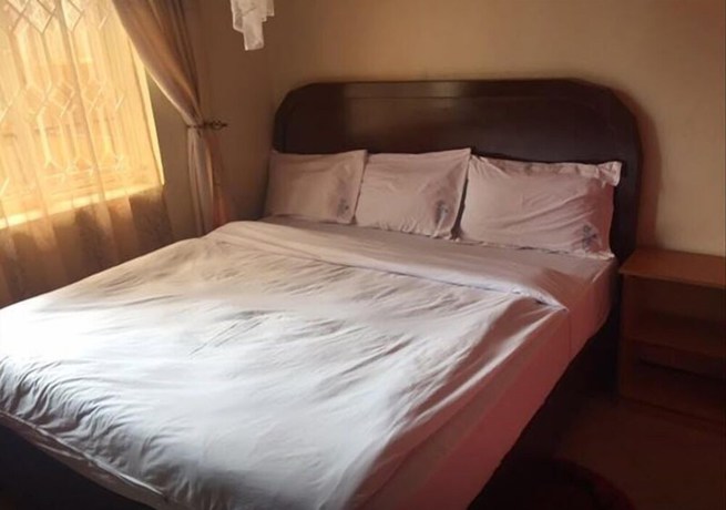 Imagen de la habitación del Hotel Bunyonyi Inn. Foto 16