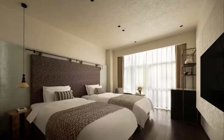Imagen de la habitación del Hotel Buqi hotel. Foto 3