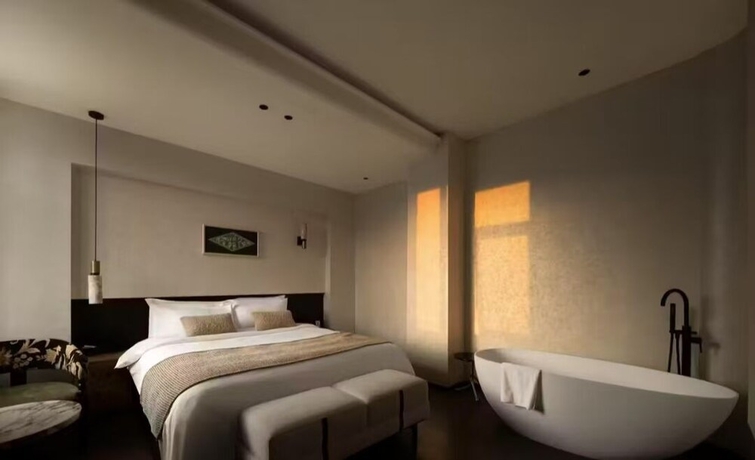 Imagen de la habitación del Hotel Buqi hotel. Foto 5