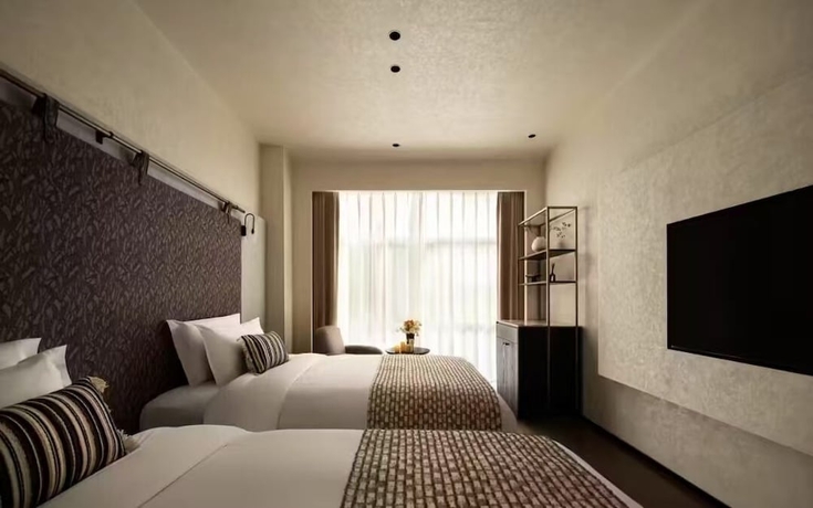 Imagen de la habitación del Hotel Buqi hotel. Foto 9