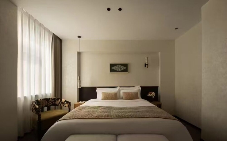 Imagen de la habitación del Hotel Buqi hotel. Foto 11