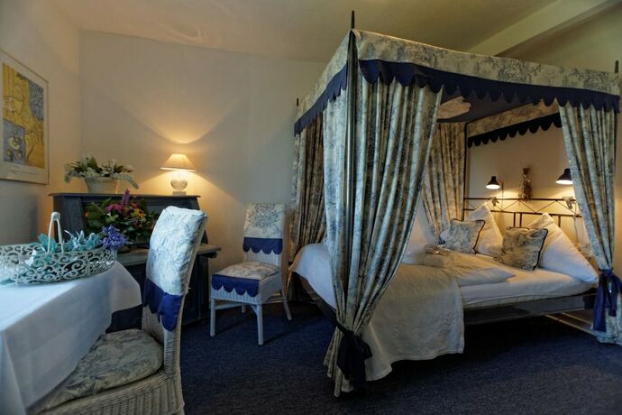 Imagen de la habitación del Hotel Burghaus and Villa Kronenburg. Foto 14