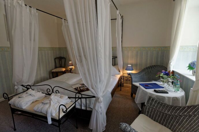 Imagen de la habitación del Hotel Burghaus and Villa Kronenburg. Foto 15