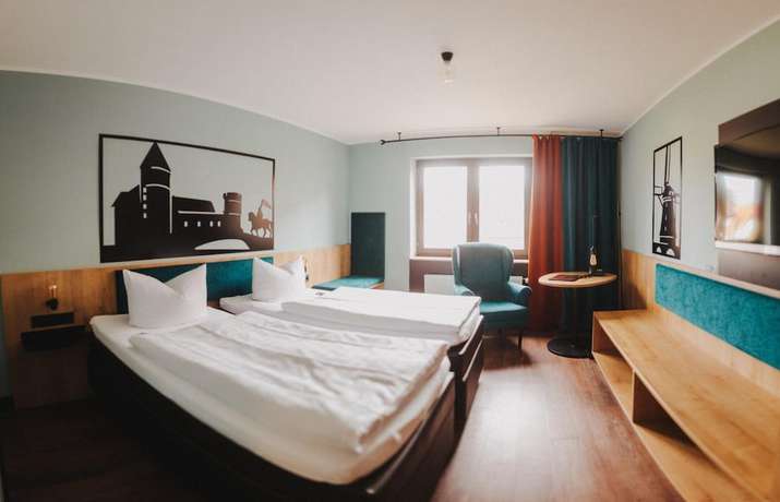Imagen de la habitación del Hotel Burghotel Pass. Foto 13