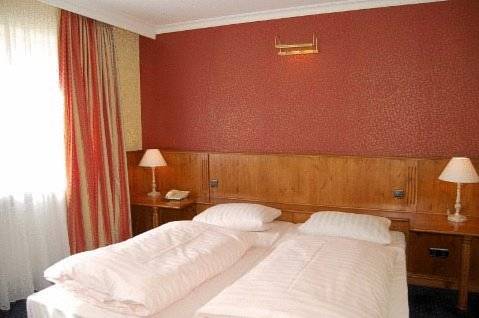 Imagen de la habitación del Hotel Burg-klause. Foto 4