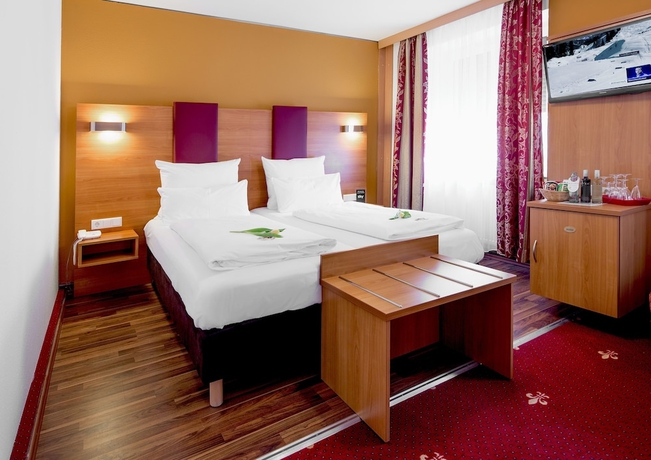 Imagen de la habitación del Hotel Burgschmiet. Foto 5