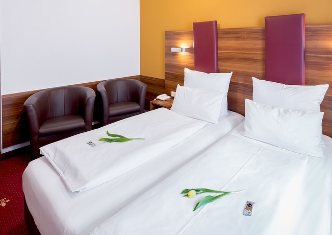 Imagen de la habitación del Hotel Burgschmiet. Foto 11