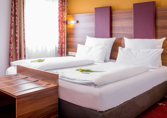 Imagen de la habitación del Hotel Burgschmiet. Foto 12