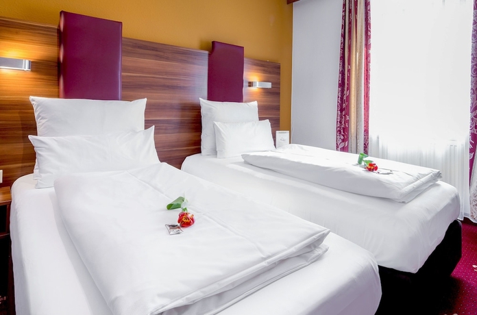 Imagen de la habitación del Hotel Burgschmiet. Foto 14