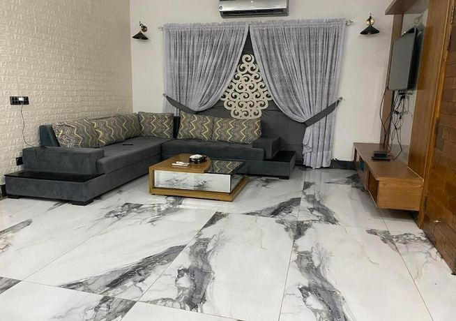 Imagen de la habitación del Hotel Burj Al Bahria Town Luxury Suites. Foto 6