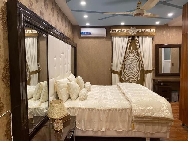 Imagen de la habitación del Hotel Burj Al Bahria Town Luxury Suites. Foto 10