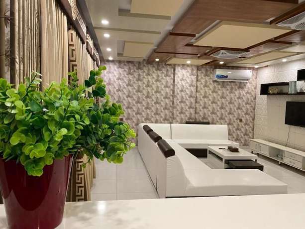 Imagen de la habitación del Hotel Burj Al Bahria Town Luxury Suites. Foto 11