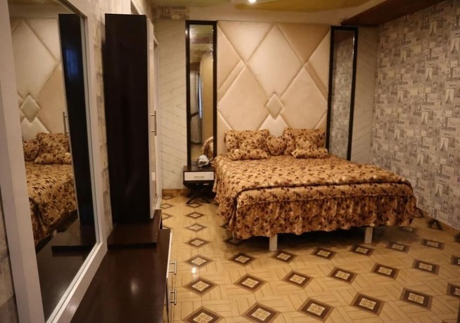 Imagen de la habitación del Hotel Burj Al Bahria Town Luxury Suites. Foto 12