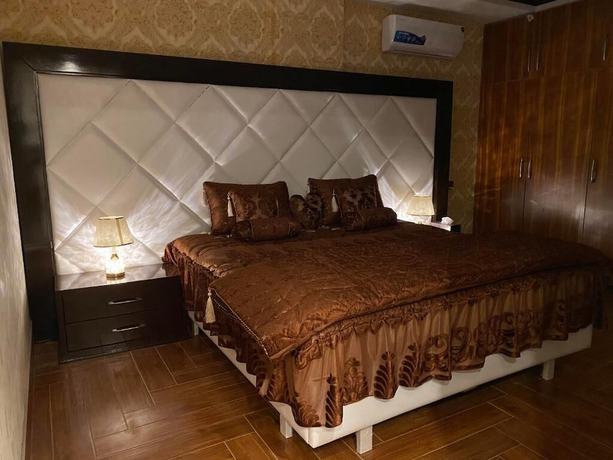 Imagen de la habitación del Hotel Burj Al Bahria Town Luxury Suites. Foto 18