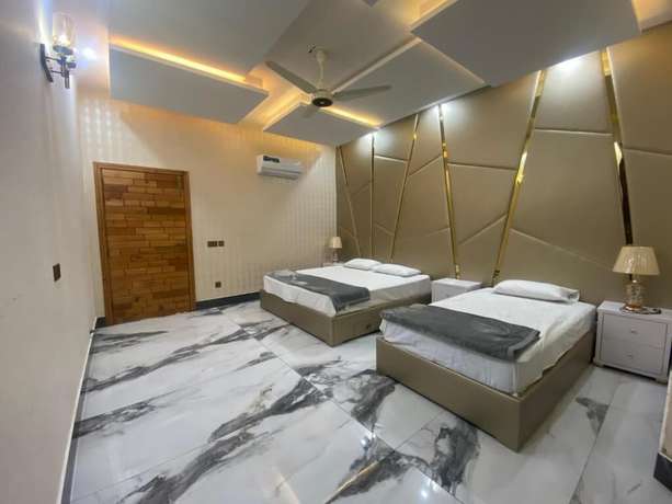 Imagen de la habitación del Hotel Burj Al Bahria Town Luxury Suites. Foto 19