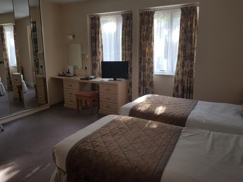 Imagen general del Hotel Burley Court. Foto 1