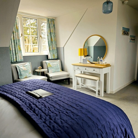 Imagen de la habitación del Hotel Burlington Berties. Foto 3