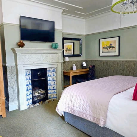 Imagen de la habitación del Hotel Burlington Berties. Foto 11
