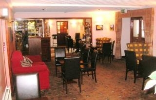 Imagen del bar/restaurante del Hotel Burnhouse Manor Hotel. Foto 2