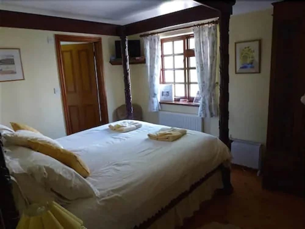 Imagen de la habitación del Hotel Burton Farmhouse. Foto 5