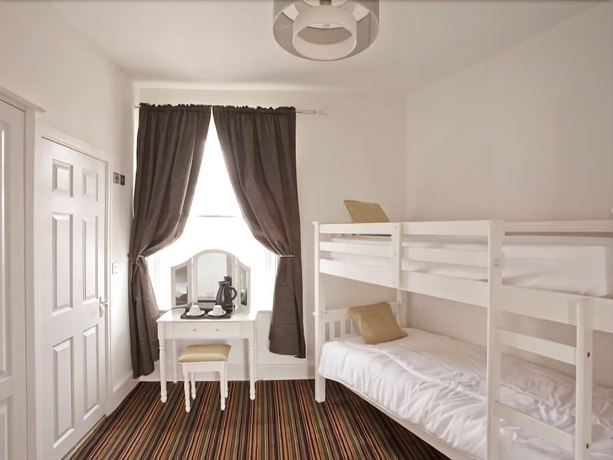 Imagen de la habitación del Hotel Burton Stone Inn. Foto 9