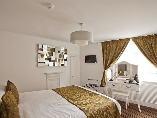 Imagen de la habitación del Hotel Burton Stone Inn. Foto 11