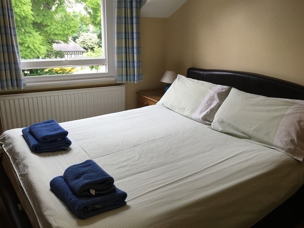 Imagen de la habitación del Hotel Burton Villa Guest House. Foto 4