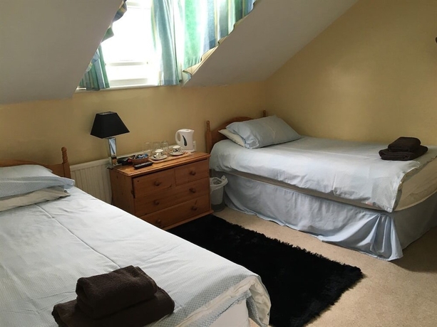 Imagen de la habitación del Hotel Burton Villa Guest House. Foto 6