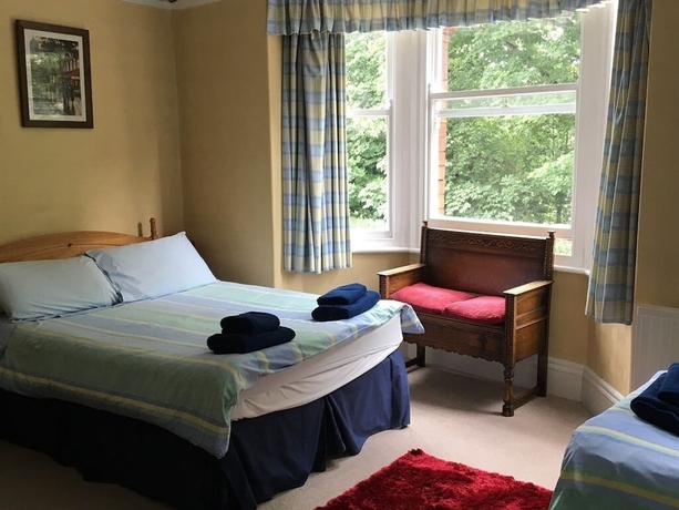 Imagen de la habitación del Hotel Burton Villa Guest House. Foto 10