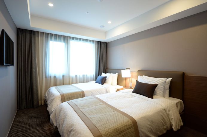 Imagen de la habitación del Hotel Busan Business. Foto 7