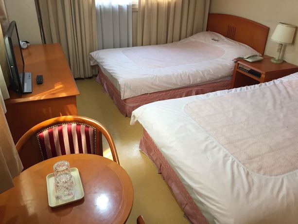 Imagen de la habitación del Hotel Busan Central. Foto 10